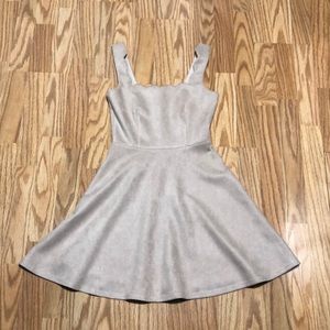 Tan dress with scalloped neckline and straps. NWOT